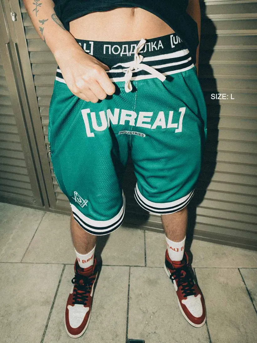 UNREAL Team shorts dollar green